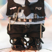 Close-up of Changbin plushie’s outfit, highlighting fabric and stitching details