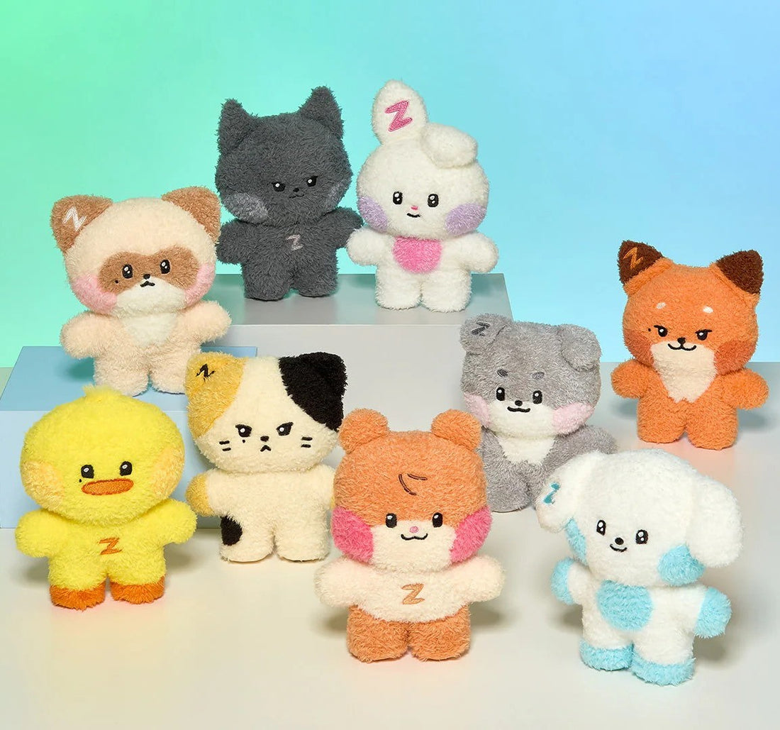 Group photo of all nine Zeroni costume plush dolls from ZEROBASEONE