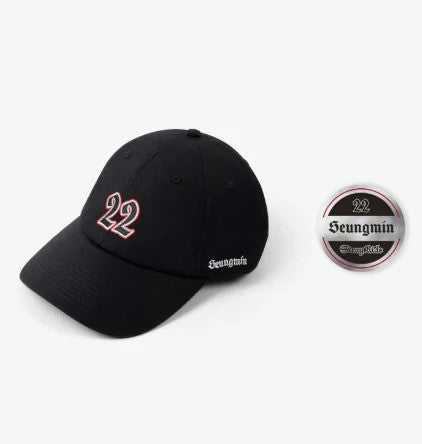 Black tour cap with “22” on the front and “Seungmin” on the side