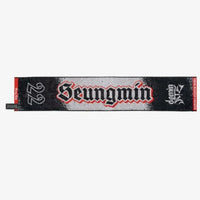 Photo of black, red and gray towel with Seungmin’s name