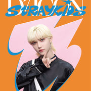 Cover of photocard collection with funky abstract graphics in orange and blue, a photo of Felix with blonde hair, and text that says “Stray Kids + Felix” and “Dicon Stray Kids”