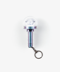 A Seventeen official light stick keyring with a clear dome top, multicolor body, and a keyring attachment.